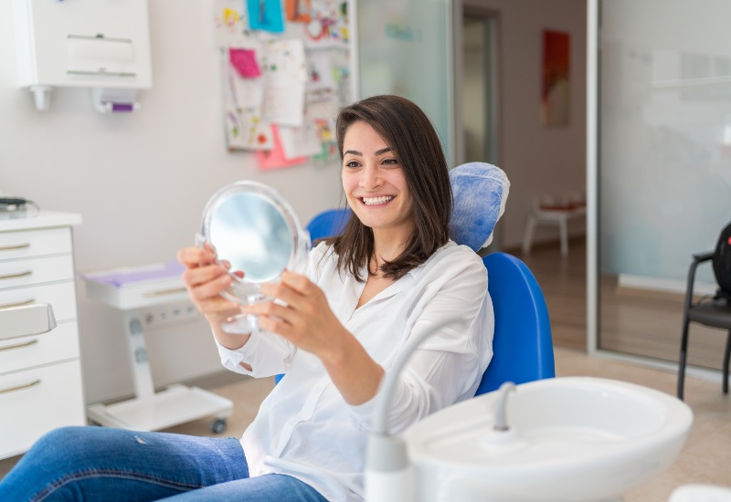 Patient smiling after the teeth whitening treatment in Antioch, IL