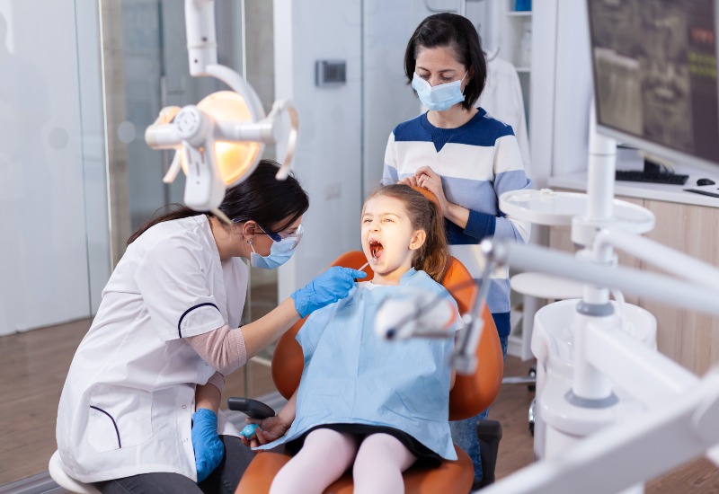 Child receiving crooked teeth treatment in Antioch, IL