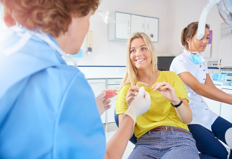 Patient receiving Invisalign® consultation for smile correction in Antioch, IL